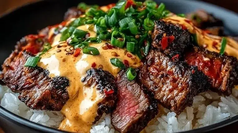 Korean BBQ Steak Rice Bowl topped with spicy cream sauce