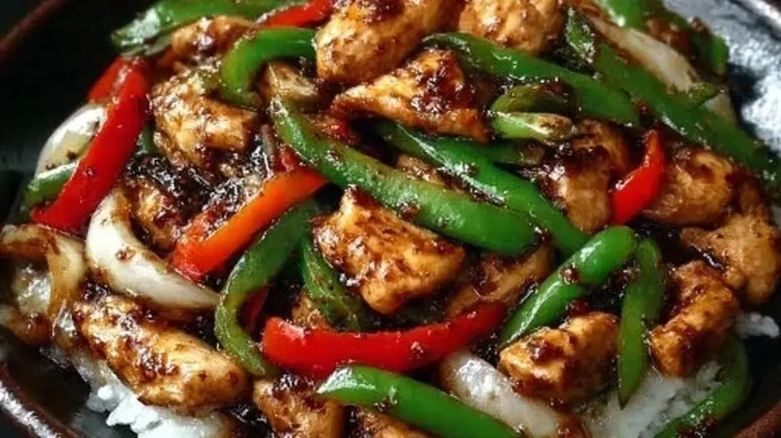 A vibrant dish of Black Pepper Chicken Stir-Fry with colorful vegetables