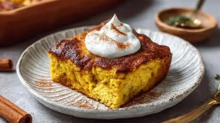 Healthy Pumpkin Cottage Cheese Bake dish topped with spices and nuts