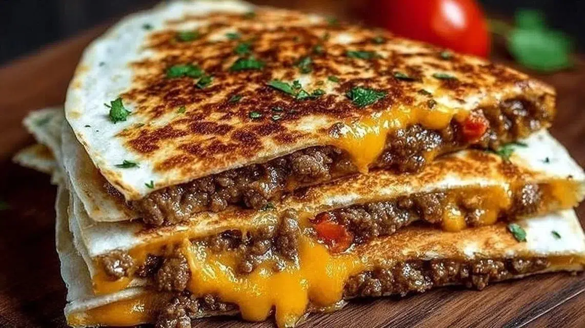 Delicious Smashburger Quesadillas served with dipping sauce.