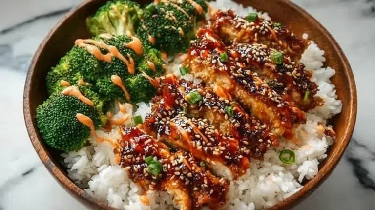 Delicious Sticky Chicken Rice Bowls with vibrant vegetables and sticky glaze.
