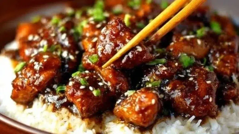 Delicious Bourbon Chicken served with rice and vegetables