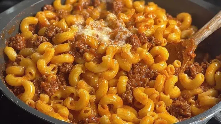 A bowl of homemade Hamburger Helper with ground beef and pasta.