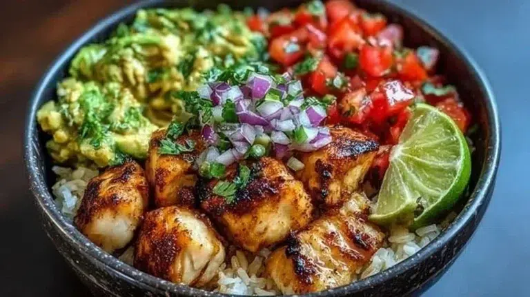 Low-carb fish taco bowls with fresh ingredients and vibrant toppings