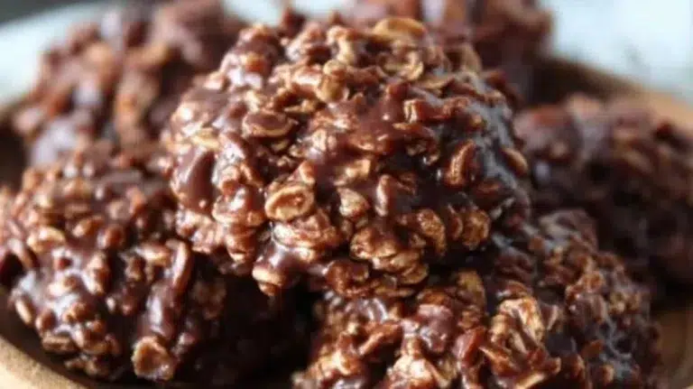 No-bake peanut butter chocolate cookies stacked on a plate