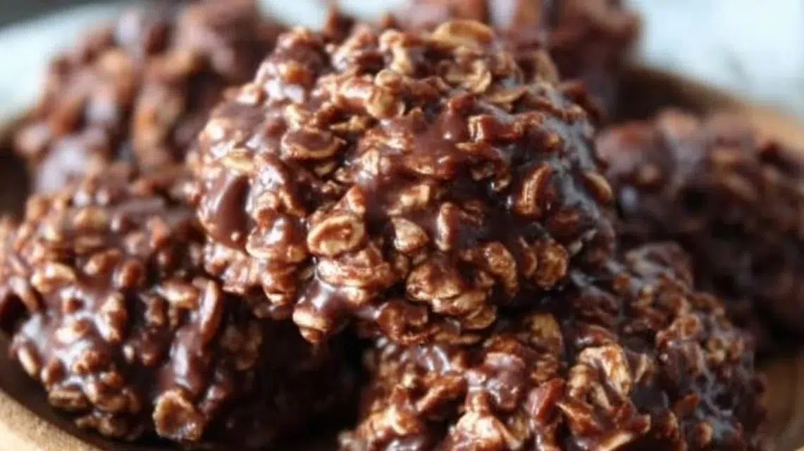 No-bake peanut butter chocolate cookies stacked on a plate
