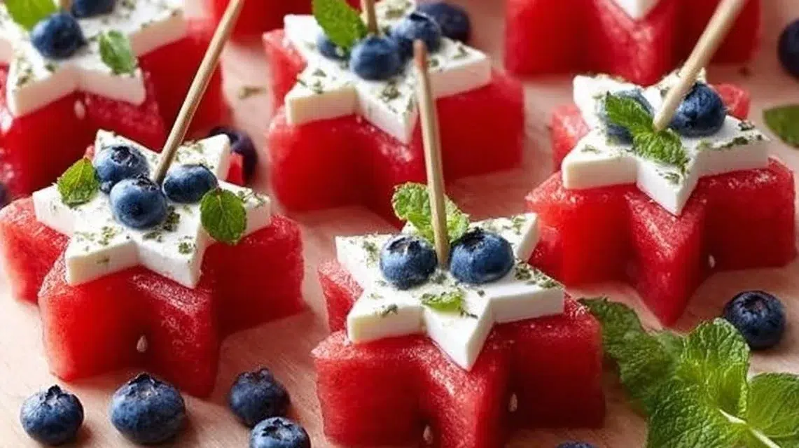 Patriotic watermelon feta skewers served on a platter for a festive gathering