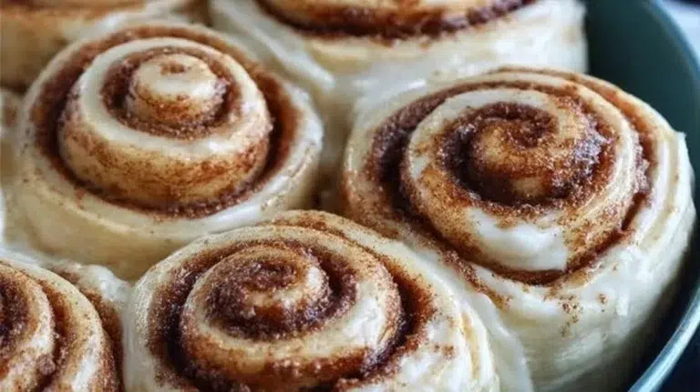 Delicious homemade sourdough cinnamon rolls fresh out of the oven.