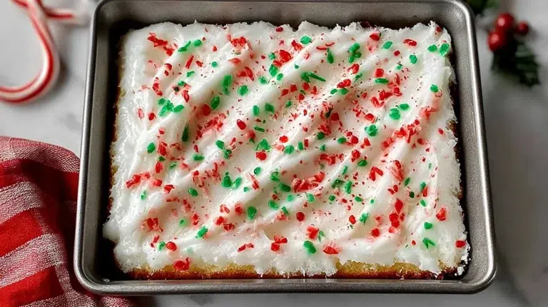 Easy Christmas Jell-O Poke Cake, a festive layered dessert for holiday celebrations.